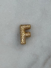 F
