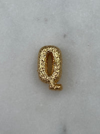 Q