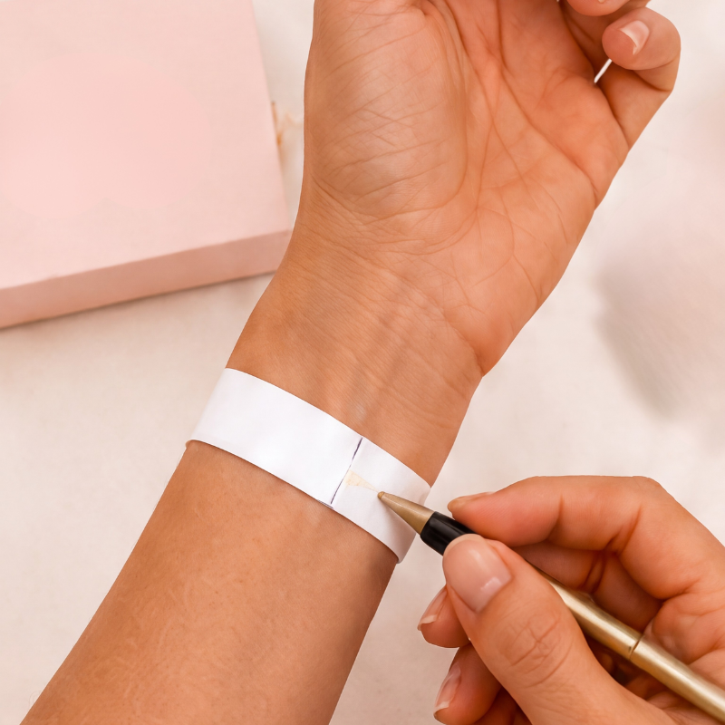 Marking the paper where it meets the taped end