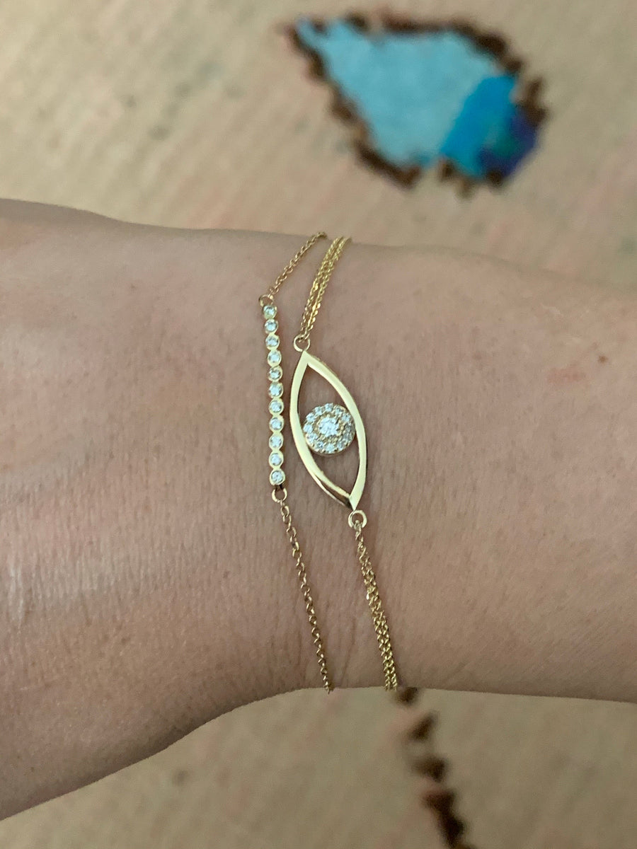 14K Gold and diamond evil eye bracelet 